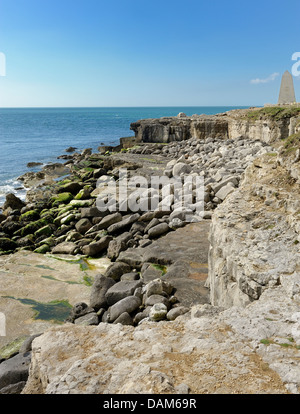 The rugged coastline at portland bill with the Stone obelisk top right of picture Dorset England uk Stock Photo