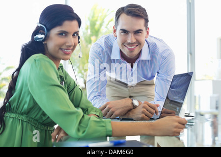 Business people talking at desk Stock Photo