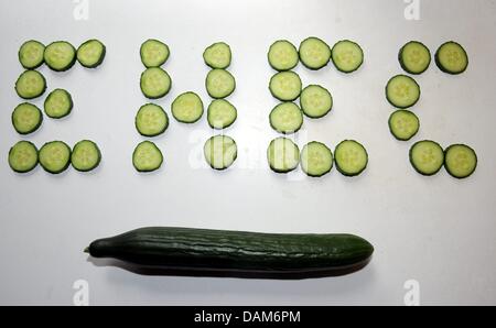 (ILLUSTRATION) An illustration dated 26 May 2011 shows the letters EHEC spelled out with slices of cucumbers in Aukrug, Germany. The Hamburg Hygiene Institute has identified Spanish cucumbers as the source of the dangerous strain of EHEC. Photo: Carsten Rehder Stock Photo