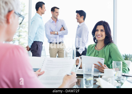 Business women talking in meeting Stock Photo