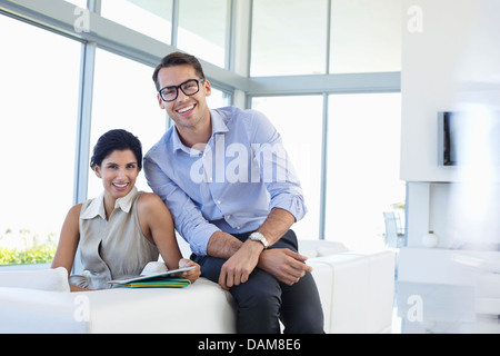 Business people smiling in office Stock Photo