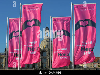 Flags of the Protestant Church Congress stand in front of the Church of Our Lady in Dresden, germany, 31 May 2011. The 33rd Protestant Church Convention will take place from 1 June to 5 June 2011. Photo: MATTHIAS HIEKEL Stock Photo