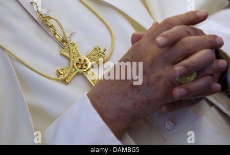 Pope Benedict XVI holds his hand folded after his arrival at the International airport of Zagreb in Croatia, 04 June 2011. The Pope is in Croatia for a two day pastoral visit. Foto: Michael Kappeler dpa Stock Photo