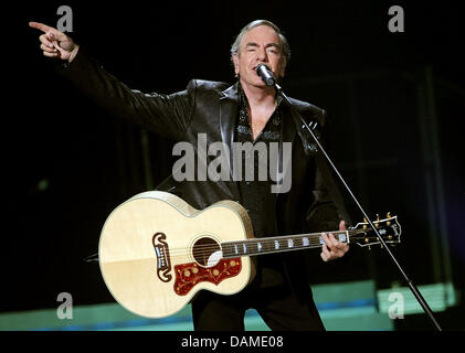 US singer Neil Diamond performs on stage during a concert at the O2 World venue in Berlin, Germany, 7 June 2011. He will also play concerts in Mannheim, Oberhausen and Hamburg. Photo: Britta Pedersen Stock Photo