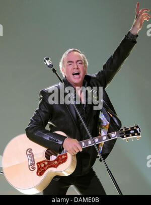 US singer Neil Diamond performs on stage during a concert at the O2 World venue in Berlin, Germany, 7 June 2011. He will also play concerts in Mannheim, Oberhausen and Hamburg. Photo: Britta Pedersen Stock Photo