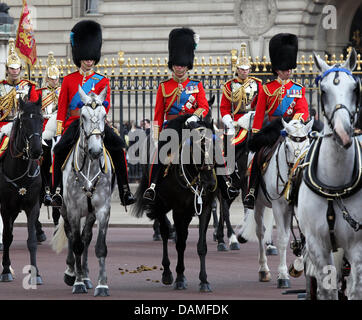 (L-R) Britain's Prince William, the Duke of Cambridge, Charles, The Prince of Wales and Edward, Duke of Kent, ride horses during the Trooping the Colour ceremony outside Buckingham Palace in London, Britain, 11 June 2011. Queen Elizabeth II's actual birthday is 21 April , but trooping the colour marks the Monarch's official birthday. Photo: Albert Nieboer (NETHERLANDS OUT) Stock Photo