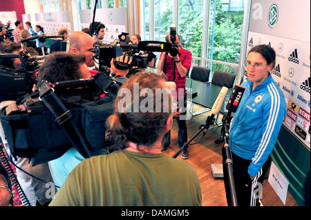 German soccer player Birgit Prinz talks to journalists during the media day of the German Football Association (DFB) at the association's headquarters in Frankfurt am Main, Germany, 14 June 2011. The FIFA women's world cup will take place in Germany from 26 June and 17 July. Photo: Marc Tirl Stock Photo