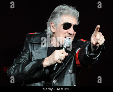 British singer, bassist and founding member of the band Pink Floyd, Roger Waters (L), performs on stage at o2 World in Berlin, Germany, 15 June 2011.  Since 1990 the singer presents the show 'The Wall' the first time in full length again. Photo: Britta Pedersen Stock Photo