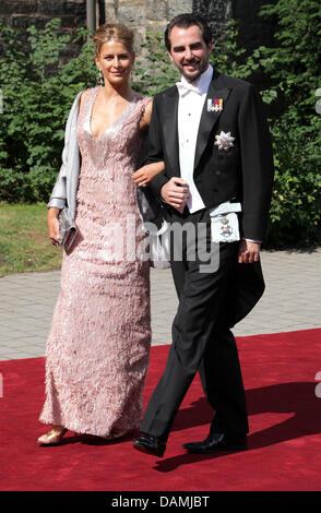 Prince Nikolaos of Greece and his wife Tatiana Blatnik arrive for the religious wedding of Princess Nathalie of Sayn-Wittgenstein-Berleburg and  Alexander Johannsmann at the Evangelical Church of the castle in Bad Berleburg, Germany, 18 June 2011. The couple had a civil marriage on May 27th, 2010. Photo: Albert Nieboer NETHERLANDS OUT Stock Photo