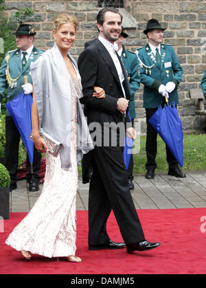 Prince Nikolaos of Greece and his wife Tatiana Blatnik leave after the religious wedding of Princess Nathalie of Sayn-Wittgenstein-Berleburg and  Alexander Johannsmann at the Evangelical Church of the castle in Bad Berleburg, Germany, 18 June 2011. The couple had a civil marriage on May 27th, 2010. Photo: Patrick van Katwijk Stock Photo