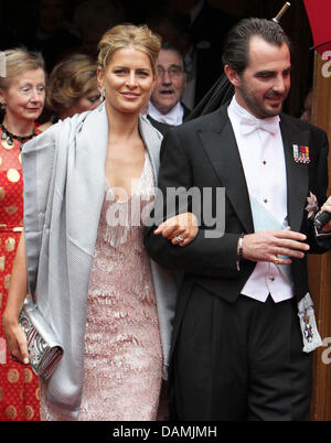 Prince Nikolaos of Greece and his wife Tatiana Blatnik leave the church after the religious wedding of Princess Nathalie of Sayn-Wittgenstein-Berleburg and Alexander Johannsmann in Bad Berleburg, Germany, 18 June 2011. The couple had a civil marriage on May 27th, 2010. Photo: Albert Nieboer  NETHERLANDS OUT Stock Photo