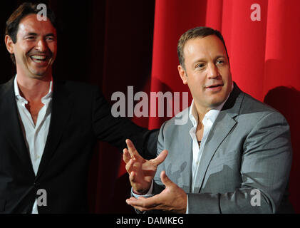 Us actor Kevin James (r) attends the premiere of his new film 'Zookeeper' in Berlin, Germany, 20 June 2011. to his left stands the managing director of Sony Pictures Releasing GmbH, Martin Bachmann. The film starts to play in German cinemas on 7 July 2011. Photo: Jens Kalaene Stock Photo