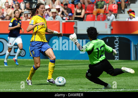 Sandra Sepulveda of Colombia (R) vies for the ball with Sweden's Lotta Schelin during the Group C match Colombia against Sweden of the FIFA Women's World Cup 2011 in Leverkusen, Germany, 28 June 2011. Photo: Revierfoto Stock Photo