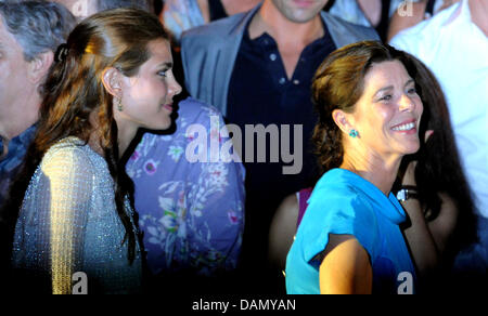 Princess Caroline of Monaco (R) and her daughter Charlotte Casiraghi attend a music and light show performed by French composer and musician Jarre to celebrate the royal wedding at Port Hercules, in Monaco, 01 July 2011. Photo: Jochen Lübke dpa Stock Photo