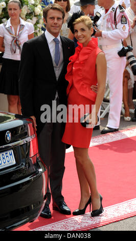 Prince Emanuele Filiberto of Venice and Piedmont and French actress Clotilde Courau, Princess of Venice and Piedmont, arrive for the religious wedding of Prince Albert II and Princess Charlene in the Prince's Palace in Monaco, 02 July 2011. Some 3500 guests are expected to follow the ceremony in the Main Courtyard of the Palace. Photo: Frank May dpa Stock Photo