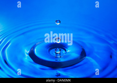 waterdrops splashing on water surface Stock Photo