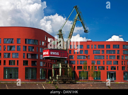 Landesarchiv NRW with crane in the inner harbour, Germany, North Rhine-Westphalia, Ruhr Area, Duisburg Stock Photo
