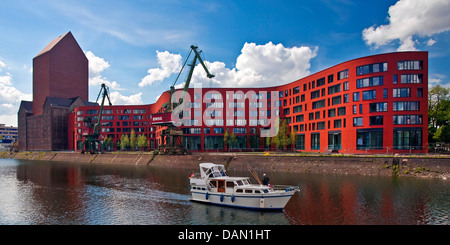 Landesarchiv NRW with two cranes in the inner harbour, Germany, North Rhine-Westphalia, Ruhr Area, Duisburg Stock Photo