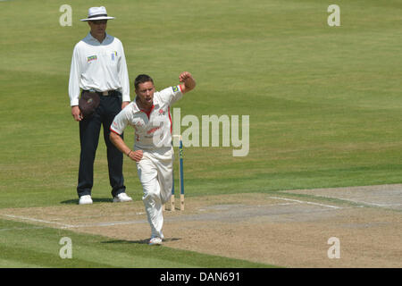 Manchester, UK. 16th July, 2013. Simon Kerrigan, Lancashire's most successful bowler celebrates getting the wicket of Mark Wallace for 37 on the second day of the 4 day match against Glamorgan. Lancashire v Glamorgan Emirates Old Trafford, Manchester, UK 16 July 2013 Credit:  John Fryer/Alamy Live News Stock Photo