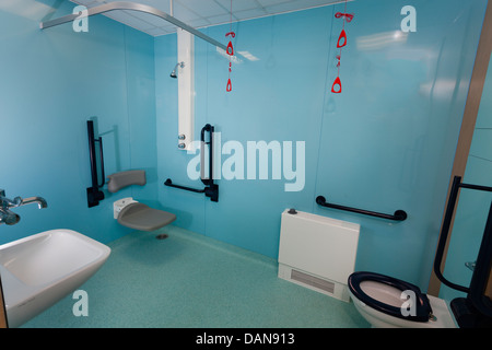 Hospital bathroom with disabled assistance bars. Stock Photo