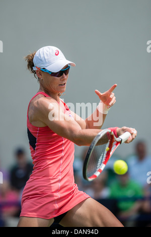 Samantha Stosur of Australia in action playing single handed forehand shot during singles match Stock Photo