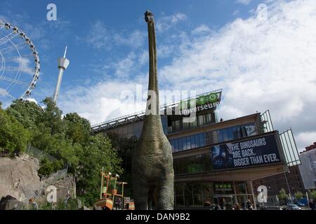 life-size dinosaur in front of the museum for world cultures in Gothenburg Stock Photo