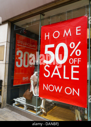 50% off sale sign in a clothes shop, York, England. Stock Photo