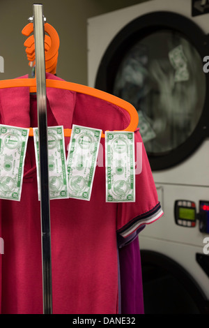 Laundry Machine Washing Notes Interior of laundry room with washing machines, wooden cabinet and ...