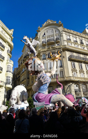 Crowded street around a fallas at the annual Las Fallas Festival in Valencia, Spain. Stock Photo