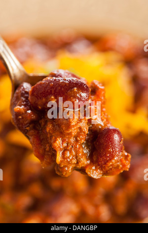 Spicy Homemade Chili Con Carne Soup in a Bowl Stock Photo