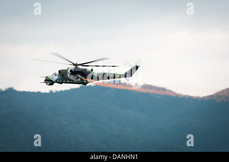 Dynamic display of Mil Mi-24 from Czech Air Force at Airpower 2013 airshow in Zeltweg, Austria, June 28, 2013 Stock Photo