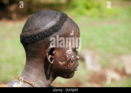 A Suri (Surma) naked man after body painting, Ethiopia Stock Photo - Alamy