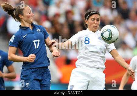 England's Fara Williams (R) and France's Gaetane Thiney vie for the ball during the quarter-final soccer match of the FIFA Women's World Cup between England and France at the FIFA World Cup stadium in Leverkusen, Germany 09 July 2011. Photo: Friso Gentsch dpa  +++(c) dpa - Bildfunk+++ Stock Photo