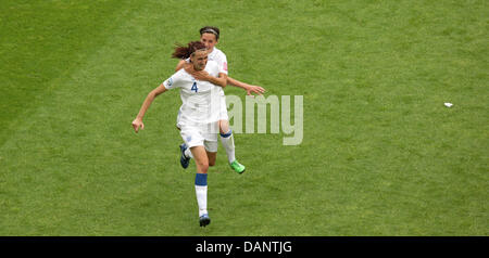 England's Jill Scott (front) celebrates with Fara Williams after scoring the 1-0 during the quarter-final soccer match of the FIFA Women's World Cup between England and France at the FIFA World Cup stadium in Leverkusen, Germany 09 July 2011. Photo: Rolf Vennenbernd dpa  +++(c) dpa - Bildfunk+++ Stock Photo