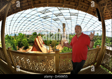 Director Dr. Joerg Junhold stands on a platform in Gondwanaland at the zoo in Leipzig, Germany, 3 June 2011. The zoo has an ongoing project with six areas where visitors and scientists can watch animals in their natural habitat. The project was founded in 1999 and will receive 130 million Euro until 2015. Photo: Waltraud Grubitzsch Stock Photo