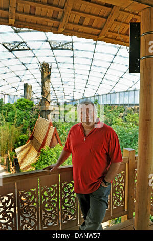 Director Dr. Joerg Junhold stands on a platform in Gondwanaland at the zoo in Leipzig, Germany, 3 June 2011. The zoo has an ongoing project with six areas where visitors and scientists can watch animals in their natural habitat. The project was founded in 1999 and will receive 130 million Euro until 2015. Photo: Waltraud Grubitzsch Stock Photo