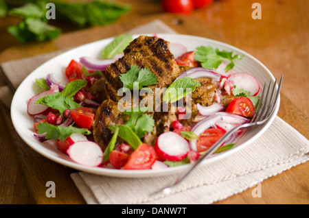 Lamb with salad Stock Photo