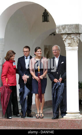 Queen Silvia, Prince Daniel, Crown Princess Victoria and King Carl Gustav (L-R) celebrate Swedish Crown Princess Victoria's 34th birthday at the Royal residence Solliden on the island of Oland, Sweden, 14 July 2011. Photo: Albert Nieboer/Royalpress NETHERLANDS OUT Stock Photo