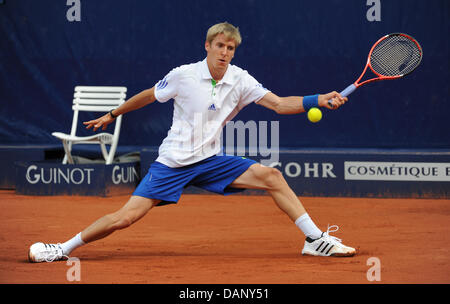 Cedrik-Marcel Stebe from Germany plays the ball during the ATP World Tour round of 16 match against Fognini from Italy at the Tennis Club Weissenhof in Stuttgart, Germany, 14 July 2011. Photo: Marijan Murat Stock Photo