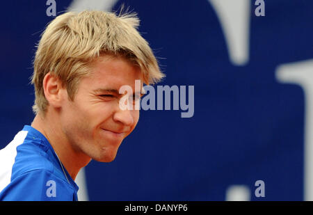 Cedrik-Marcel Stebe from Germany plays during the quarter-finale match in the ATP tennis tournament against Andujar from Spain at Weissenhof in Stuttgart, Germany, 15 July 2011. Ferrero won in two sets by 6-4 and 6-3. Photo: Marijan Murat Stock Photo