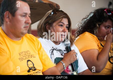 July 16, 2013 - Tucson, Arizona, U.S. - GUADALUPE GUERRERO, the mother of a  C. Lamadrid, a 19-year-old U.S. citizen shot in the back three times by U.S. Border Patrol agents in 2011, cries while talking about violence on the border. Eight Tucsonans will spend the next five days fasting as a protest against alleged police collaboration with U.S. Border Patrol, migrant deaths in the desert and the militarization of the border. The group gathered at a Tucson, Ariz. church to make the announcement. (Credit Image: © Will Seberger/ZUMAPRESS.com) Stock Photo