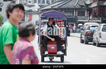 German swimmer Paul Biedermann is seen during a visit of the Yu Garden prior the 2011 FINA World Swimming Championships in Shanghai, China, 18 July 2011. Photo: Bernd Thissen dpa Stock Photo