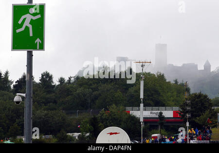 The castle of Nürburg is seen behind the track prior to the Formula One Grand Prix of Germany at the F1 race track of Nuerburgring, Nuerburg, Germany, 24 July 2011. Photo: Jens Büttner dpa/lrs Stock Photo