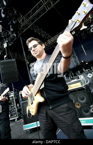 Bassist Nadim Abou-Chacra of the Libanese rock band The Kordz performs in Dresden, Germany, 23 July 2011. Photo: Lutz Mueller-Bohlen Stock Photo