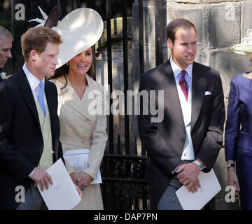 Prince Harry, Duchess Catherine and Prince William leave the Canongate Kirk in Edinburgh after the wedding ceremony of Zara Phillips and Mike Tindall, 30 July 2011. Zara is a granddaughter of the Queen, Mike a well-known Rugby player. Photo: Albert Nieboer Stock Photo