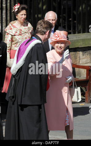 Queen Elizabeth II. and Princess Anne leave the Canongate Kirk in Edinburgh after the wedding ceremony of Zara Phillips and Mike Tindall, 30 July 2011. Zara is a granddaughter of the Queen, Mike a well-known Rugby player. Photo: Albert Nieboer Stock Photo