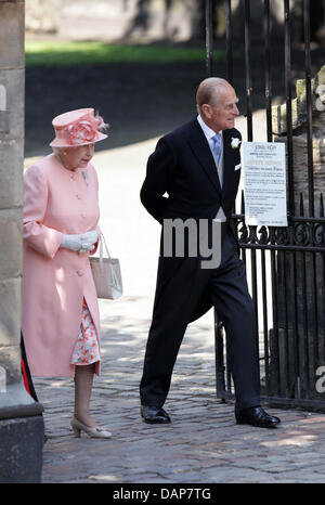 Queen Elizabeth II. and Prince Philip leave the Canongate Kirk in Edinburgh after the wedding ceremony of Zara Phillips and Mike Tindall, 30 July 2011. Zara is a granddaughter of the Queen, Mike a well-known Rugby player. Photo: Albert Nieboer Stock Photo