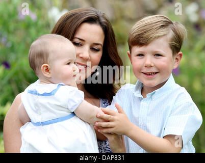 The Danish Royal Family members Crown Princess Mary with daughter Josephine and  Prince Christian pose during the annual photo session at Graasten Palace in Grasten, Denmark, 1 August 2011. Photo: Patrick van Katwijk Stock Photo