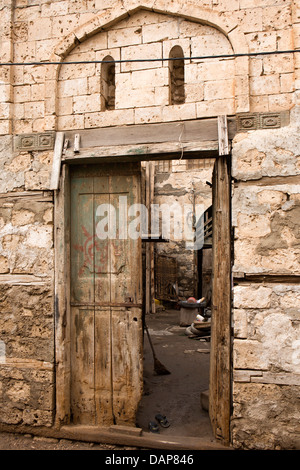 Africa, Eritrea, Massawa, Old Town, open doorway into yard of historic coral block built house Stock Photo