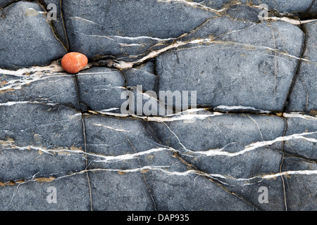 Eroded Limestone rock and pebble pattern. Northumberland Coastline. England Stock Photo